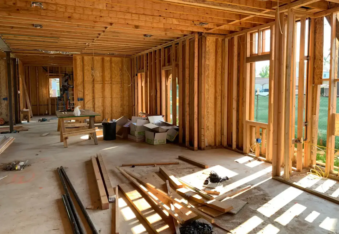 Exposed wood framing inside a house under construction
